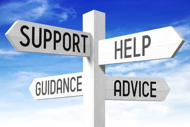 Signpost with Support, Help, Guidance & Advice signs